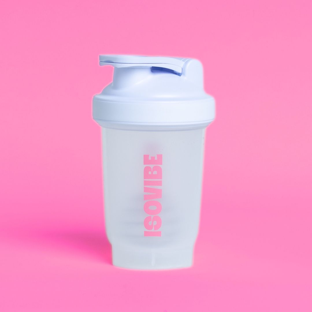 ISOVIBE shaker on bright pink background with a logo and metal ball