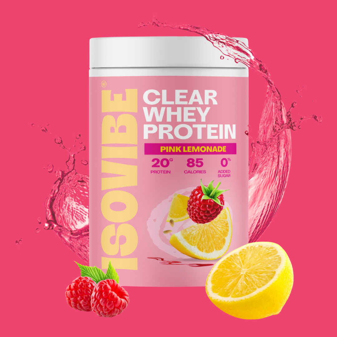 Pink Lemonade ISOVIBE tub with splashed of water, sliced lemon and raspberries in front