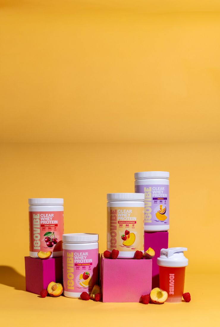 Range of ISOVIBE clear whey on a yellow background